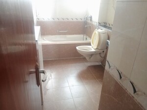 Bathroom in 3 BHK Apartment at Parsvnath Green Ville, Sector 48 – for Rent