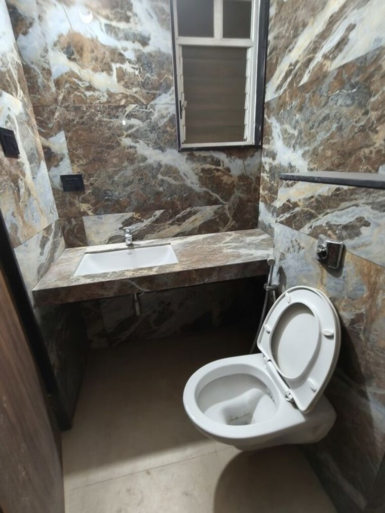 Bathroom, krishna-amorapolis 2 Bedroom 704 Sq.Ft. Apartment In Dhanori Pune 10131961