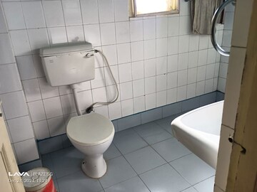 Bathroom in 4 BHK Apartment at Geeta Nagar – for Sale