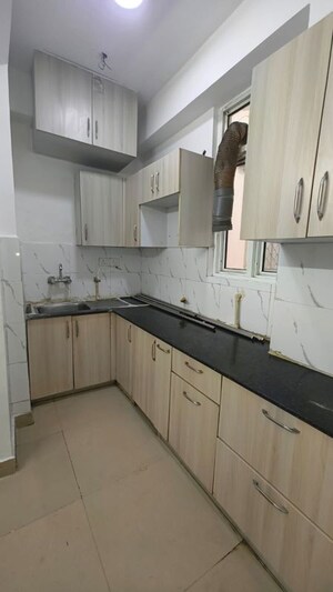Kitchen in 2 BHK Apartment at Supertech Cape Town, Sector 74 – for Sale