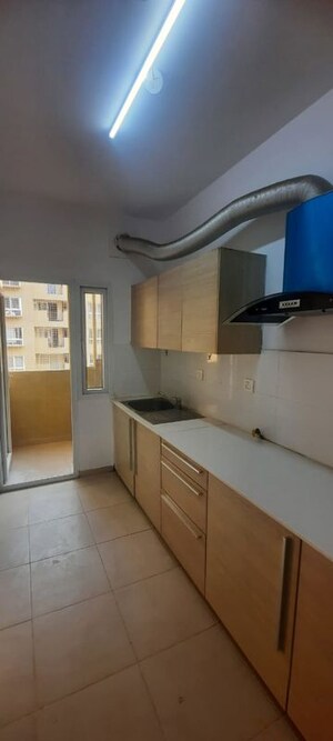 Kitchen in 2 BHK Apartment at Bhartiya Nikoo Homes, Thanisandra Main Road – for Rent