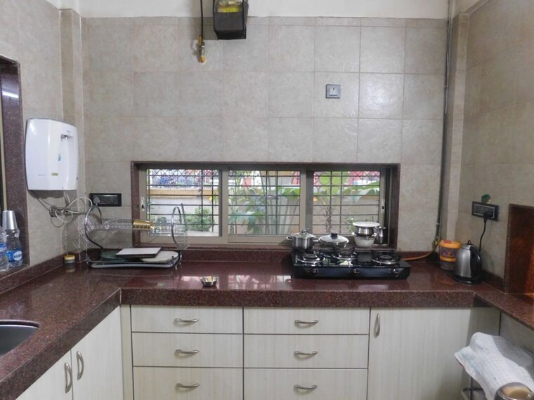Kitchen, om-dwarkanath-chs 5 Bedroom 1650 Sq.Ft. Independent House In Nerul Navi Mumbai 10132272