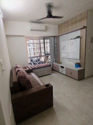 Living Room in 1 BHK Apartment at Lodha Amara, Kolshet Road – for Rent