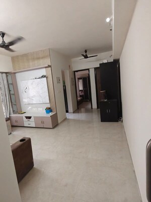 Living Room in 1 BHK Apartment at Lodha Amara, Kolshet Road – for Rent