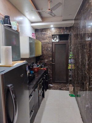 Kitchen in 3 BHK Builder Floor at Sushant Lok I – for Rent