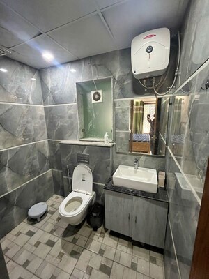 Bathroom in 3 BHK Builder Floor at Ansal Sushant Lok I, Sector 43 – for Rent