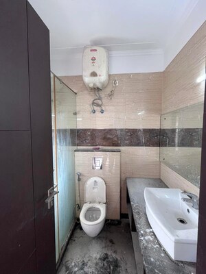 Bathroom in 3 BHK Builder Floor at Sushant Vyapaar Kendra, Dlf Phase iv – for Rent