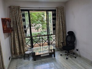 Living Room in 1 BHK Apartment at Hiranandani Gardens Canna, Powai – for Rent