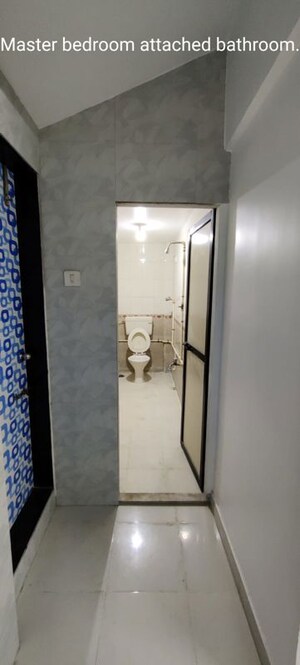 Bathroom in 3 BHK Apartment at Agarwal Green Village Row House, Mira Road East – for Rent