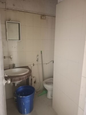Bathroom in 1 BHK Apartment at Royal Palms Garden View, Goregaon East – for Sale