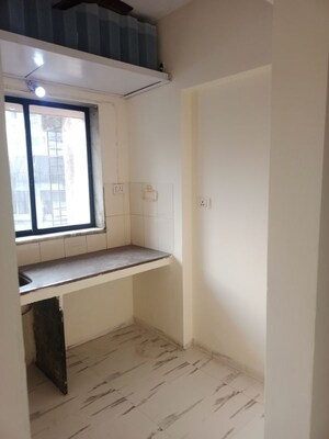 Room in 1 BHK Apartment at Royal Palms Garden View, Goregaon East – for Sale