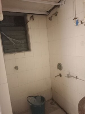 Bathroom in 1 BHK Apartment at Royal Palms Garden View, Goregaon East – for Sale