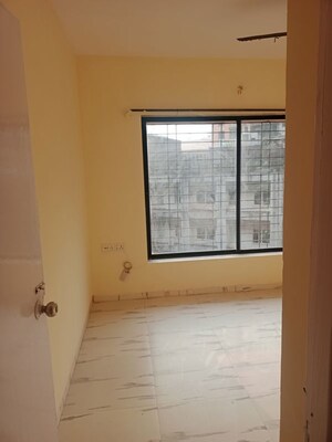 Room in 1 BHK Apartment at Royal Palms Garden View, Goregaon East – for Sale