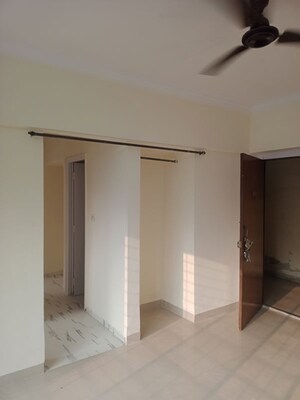 Room in 1 BHK Apartment at Royal Palms Garden View, Goregaon East – for Sale