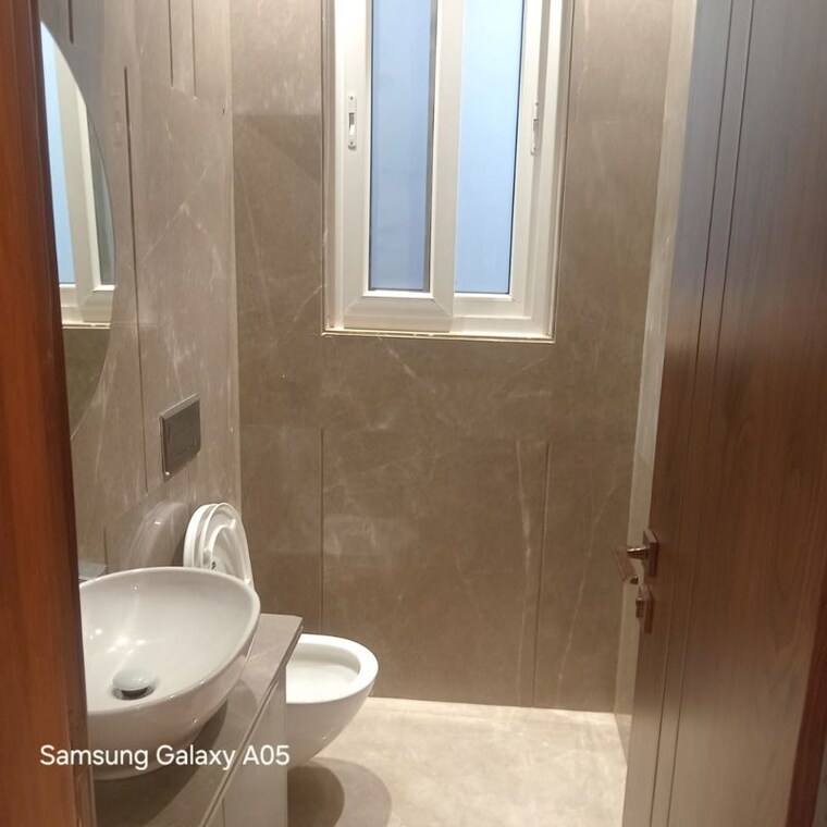 Bathroom, greater kailash ii 4 Bedroom 300 Sq.Yd. Builder Floor In Greater Kailash ii Delhi 10134859