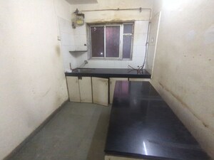 Kitchen in 1 BHK Apartment at Veena Nagar CHS, Mulund West – for Rent