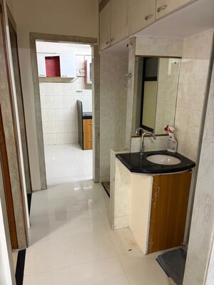 Bathroom in 1 BHK Apartment at Yogi Hills, Mulund West – for Rent