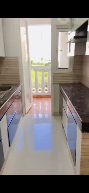 Kitchen in 2.5 BHK Apartment at Radhey Krishna Casa Green I, Sector 16 Greater Noida – for Sale