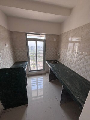 Kitchen in 1 BHK Apartment at Anushka Arya Greens, Bhandup West – for Sale