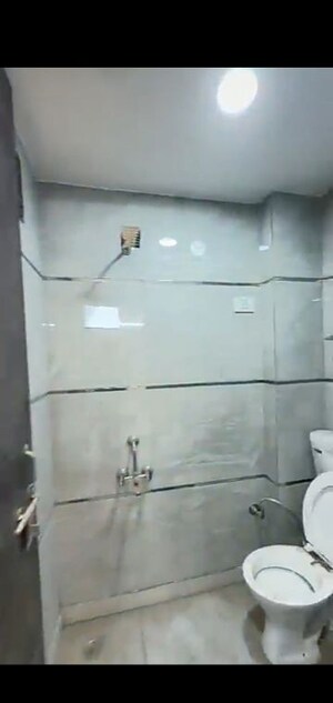 Bathroom in 3 BHK Builder Floor at Dwarka Mor – for Sale
