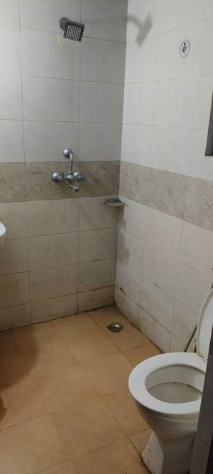 Bathroom in 3 BHK Apartment at Charms Castle, Raj Nagar Extension – for Rent