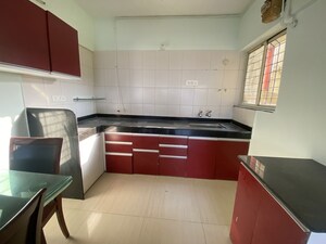 Kitchen in 3 BHK Apartment at Ganesham Phase I, Pimple Saudagar – for Rent