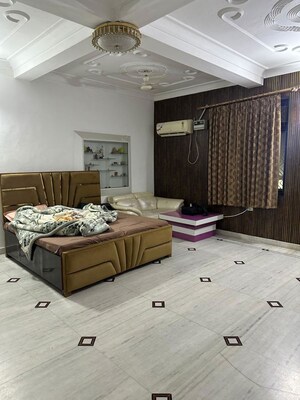 Bedroom in 2 BHK Builder Floor at Ansal Plaza Sector-23, Sector 23 – for Rent