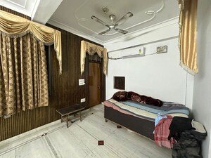 Bedroom in 2 BHK Builder Floor at Ansal Plaza Sector-23, Sector 23 – for Rent