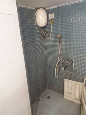 Bathroom in 2 BHK Apartment at Oshiwara Mhada, Andheri West – for Rent