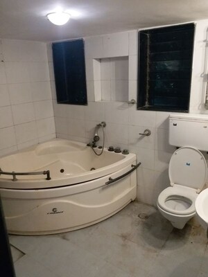 Bathroom in 2 BHK Apartment at Oshiwara Mhada, Andheri West – for Rent