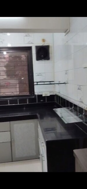 Kitchen in 2 BHK Apartment at Samartha Deep, Andheri West – for Rent