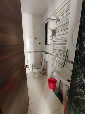 Bathroom in 1 BHK Apartment at Damji Shamji Kalpvruksha Tulip, Kasarvadavali – for Rent