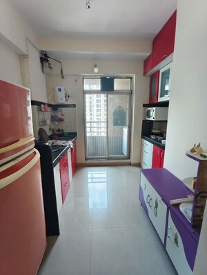 Kitchen in 1 BHK Apartment at Damji Shamji Kalpvruksha Tulip, Kasarvadavali – for Rent