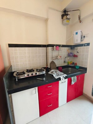 Kitchen in 1 BHK Apartment at Damji Shamji Kalpvruksha Tulip, Kasarvadavali – for Rent