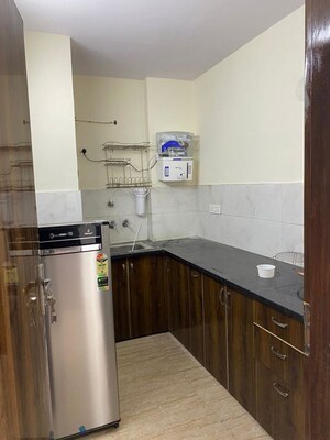 Kitchen in 1.5 BHK Builder Floor at Tagore Garden Extension – for Rent