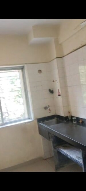 Kitchen in 2 BHK Apartment at Vasant Leela Complex, Vijay Nagari – for Rent