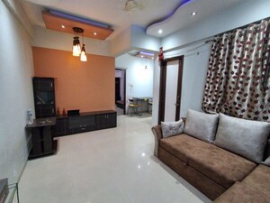 Living Room in 1 BHK Apartment at GRACIA CHS, Kharadi – for Rent
