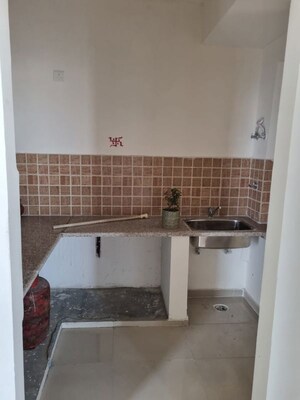 Kitchen in 2 BHK Apartment at Mahagun Mywoods, Sector 16c Greater Noida – for Sale