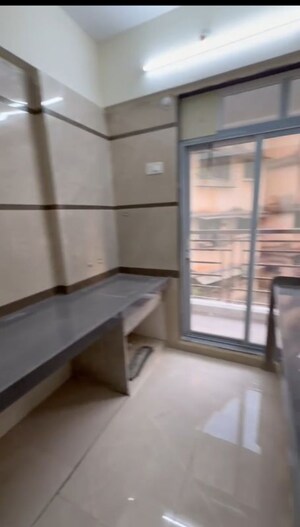 Kitchen in 2 BHK Apartment at Patel Horizon, Badlapur West – for Sale