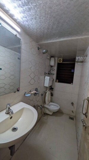 Bathroom in 1 BHK Apartment at Riddhi Garden, Malad East – for Rent