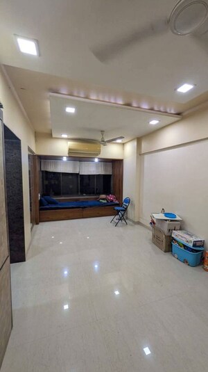 Living Room in 1 BHK Apartment at Riddhi Garden, Malad East – for Rent