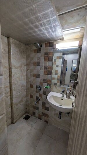 Master Bedroom in 1 BHK Apartment at Riddhi Garden, Malad East – for Rent