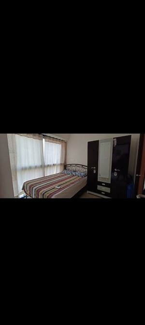 Bedroom in 1 BHK Apartment at Duville Riverdale Suites, Kharadi – for Rent