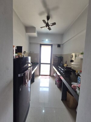 Kitchen in 1 BHK Apartment at Lodha Palava City Lakeshore Greens, Dombivli East – for Sale