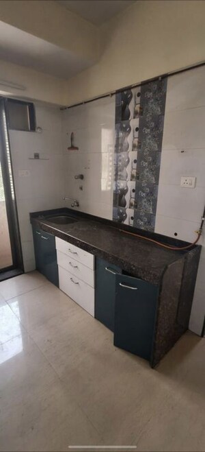 Kitchen in 2 BHK Apartment at Raj Shivganga, Kandivali West – for Rent
