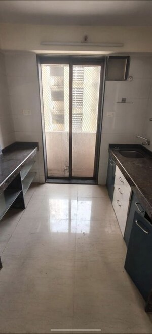 Kitchen in 2 BHK Apartment at Raj Shivganga, Kandivali West – for Rent