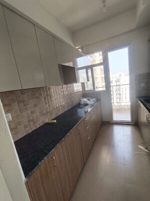 Kitchen in 3 BHK Apartment at Amrapali Crystal Homes, Sector 76 – for Rent