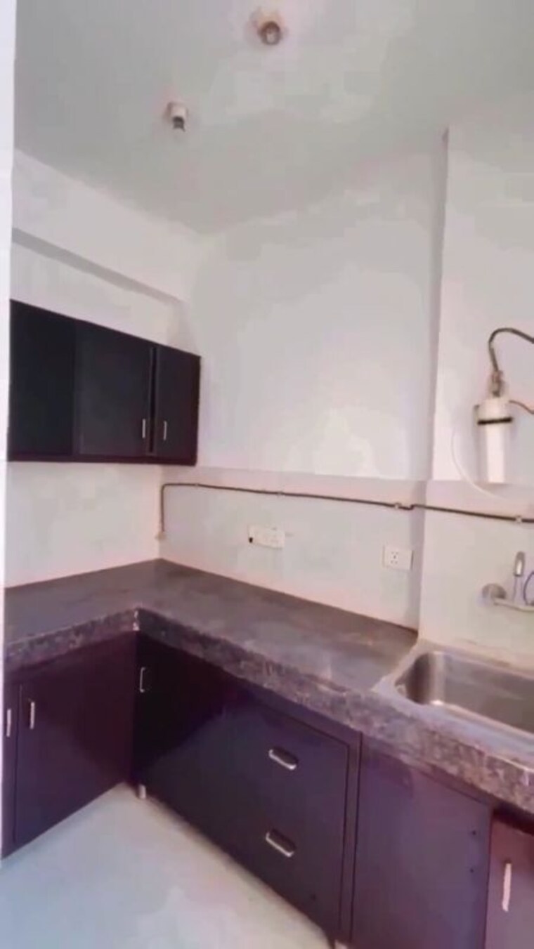 Kitchen, ajnara-le-garden 2 Bedroom 875 Sq.Ft. Apartment In Sector 16b Greater Noida Greater Noida 10137108