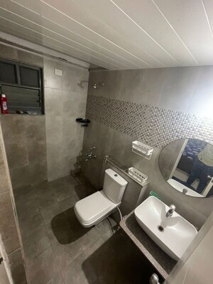 Bathroom in 3 BHK Apartment at Rohan Abhilasha Building D, Wagholi – for Rent