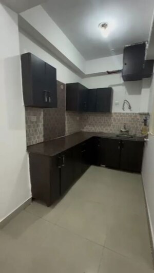 Kitchen in 2 BHK Apartment at Supertech Livingston, Sain Vihar – for Sale